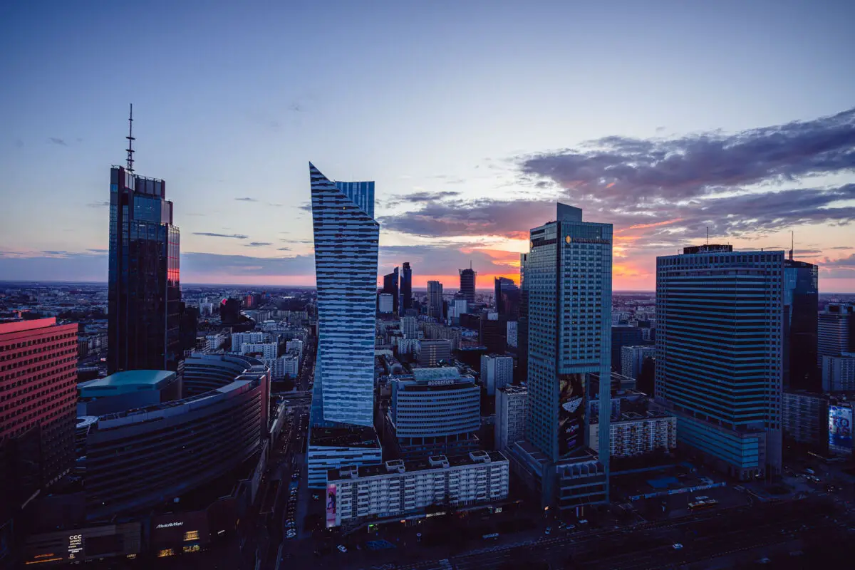 The city center of Warsaw during sunset.