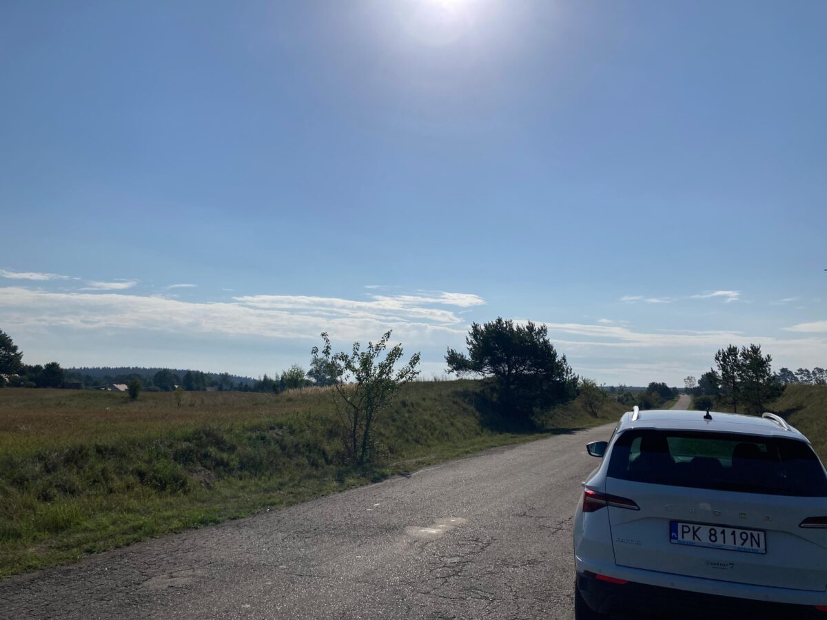 Car parked on country road in Poland
