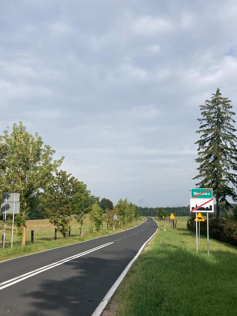 The white rectangular sign with a crossed-out city means that you're leaving a city